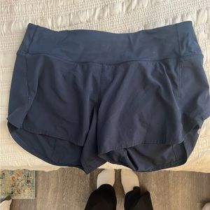Lululemon Speed Up Mid-Rise Lined Short 4” in True Navy Blue size 8